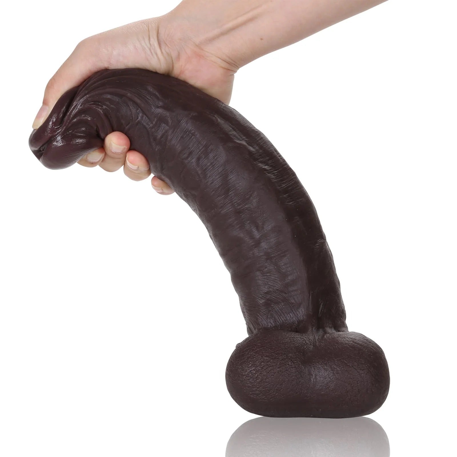 Levi 11inch Big Black Hyper Silicone Realistic Dildo being held to show flexibility and size